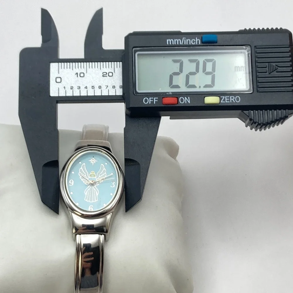 Angel Women's Watch Silver Tone Blue Oval Cuff Christian 23mm New Battery 6.25